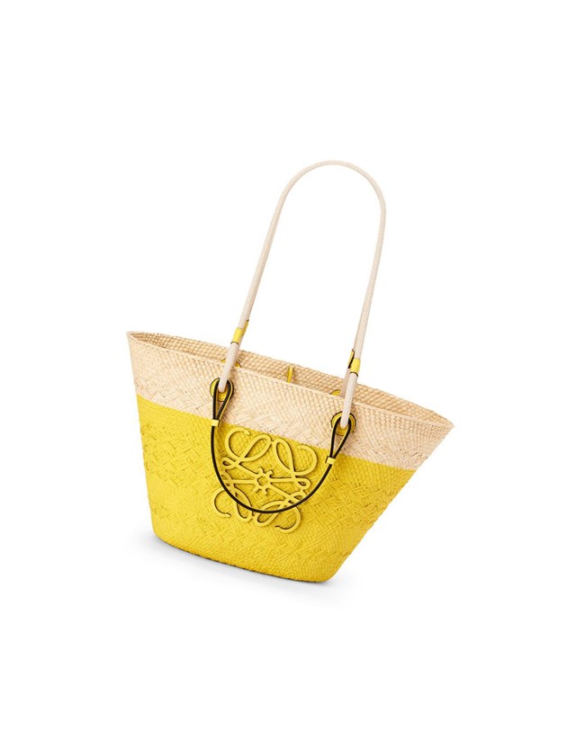 Loewe Anagram Basket bag in iraca palm and calfskin Citron | 7356YIQFK